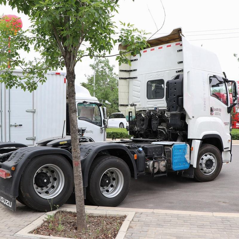 Left side view of white used Isuzu GIGA Vc66 520hp 6x4 manual heavy duty tractor truck