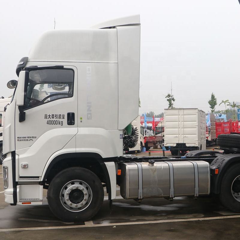 Left side view of white used Isuzu GIGA Vc66 520hp 6x4 manual high roof cabin heavy tractor truck