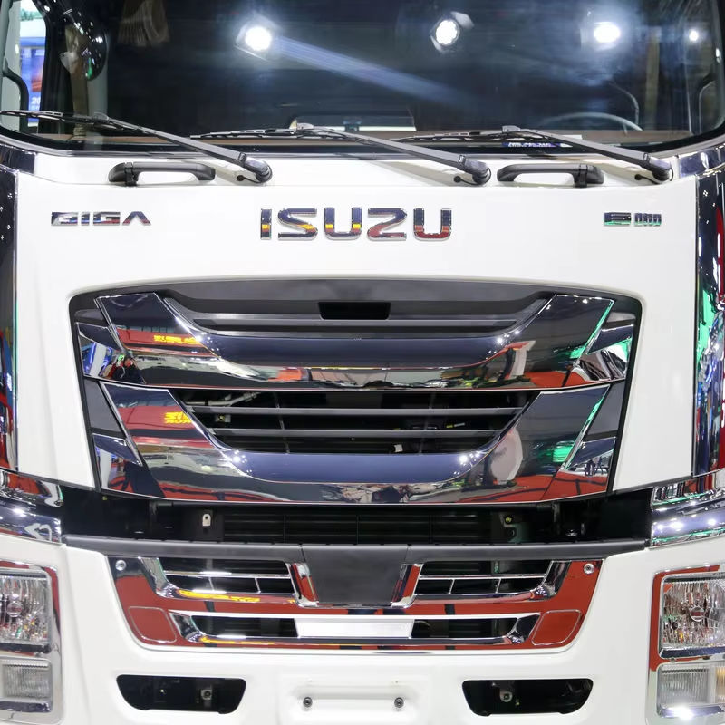 Front grille view of used Isuzu Giga Vc66 6x4 tractor, with ISUZU logo, 520HP Euro VI automatic transmission