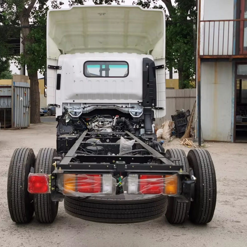 Rear view of Isuzu KV 800 4x2 diesel truck chassis, showing rear axles and tail light assembly