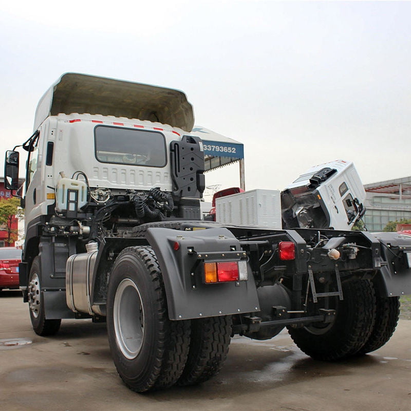 Rear side view of 2020 Isuzu VC61 4x2 used tractor truck, showing rear wheels and fifth wheel