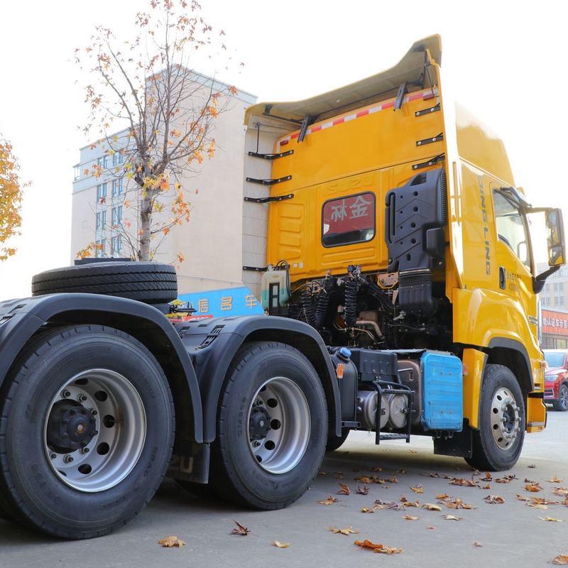 Rear right wheel detail view of yellow used Isuzu GIGA Vc66 460hp 6x4 heavy tractor truck