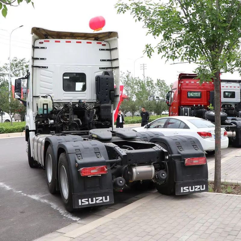 Rear right side view of Isuzu Giga VC66 6x4 heavy-duty tractor truck, showing rear chassis and axle assembly