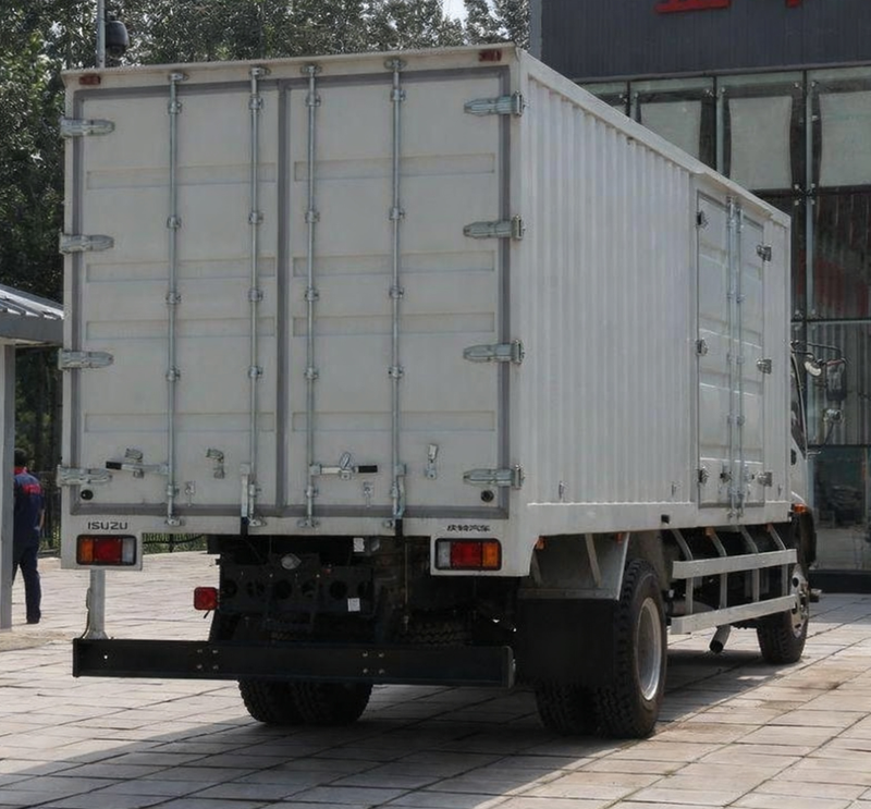 Rear view of Isuzu Fvr 8.6m box van freight truck, showing enclosed cargo box rear doors